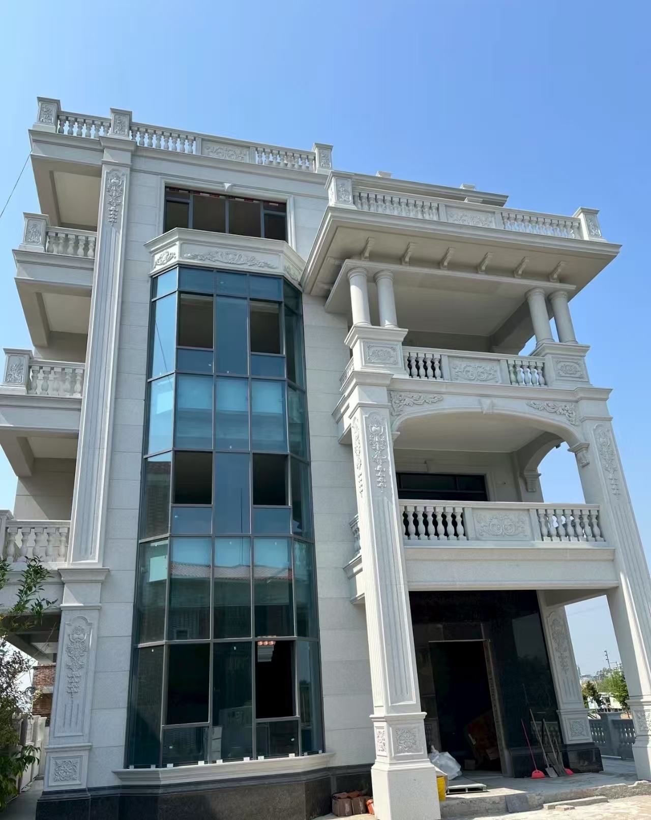 驻马店 白麻花岗岩别墅外墙干挂效果展示